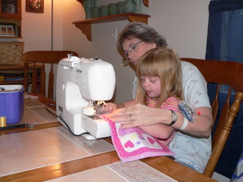 Jenny sews with Grandma