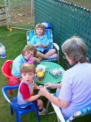 Emma, Jenny and Nic sewing with Grandma